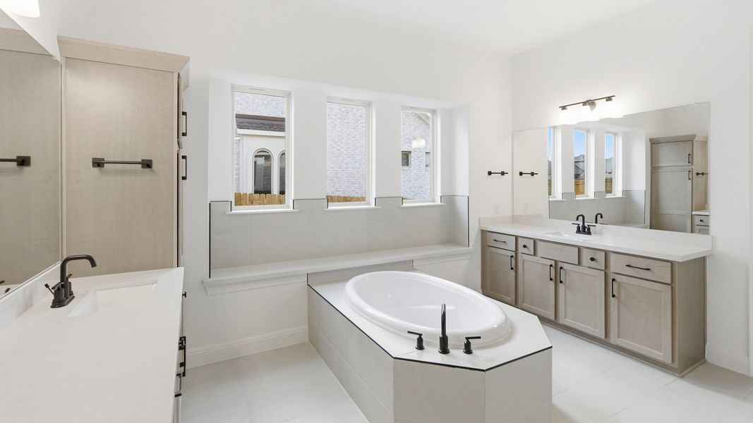 Furnished interior view inside a new home in Oaks at San Gabriel, Georgetown (Image 12).