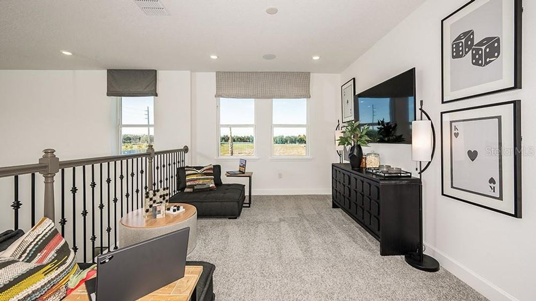 Furnished interior view inside a new home in Lochside, Mount Dora (Image 5).