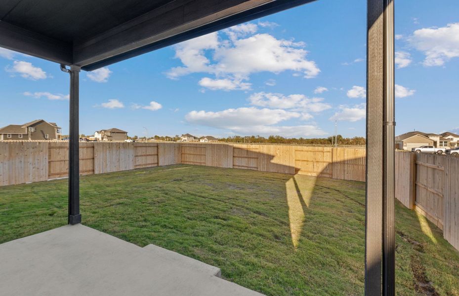 Exterior details and patio area of a home in Patterson Ranch, Georgetown (Image 24).
