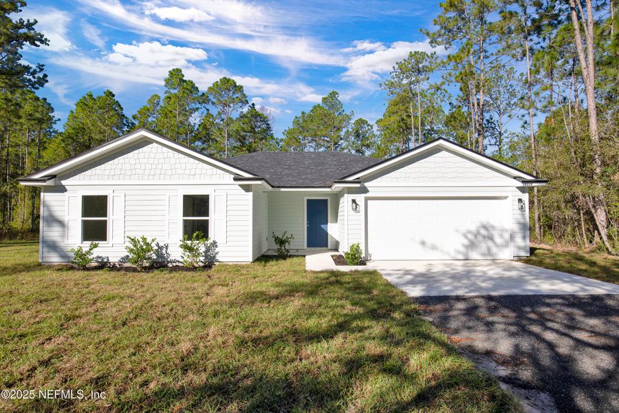 Front exterior of a new home in , Hastings, FL, highlighting curb appeal (Image 21). Front exterior of a new home in , Hastings, FL, highlighting curb appeal (Image 21).