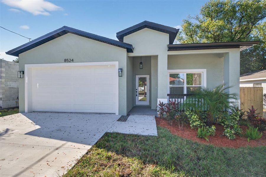 Front exterior of a new home in , Tampa, FL, highlighting curb appeal (Image 29). Front exterior of a new home in , Tampa, FL, highlighting curb appeal (Image 29).