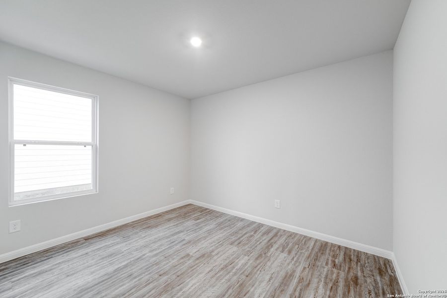Spacious, unfurnished interior of a new home in The Park, Uvalde (Image 10).