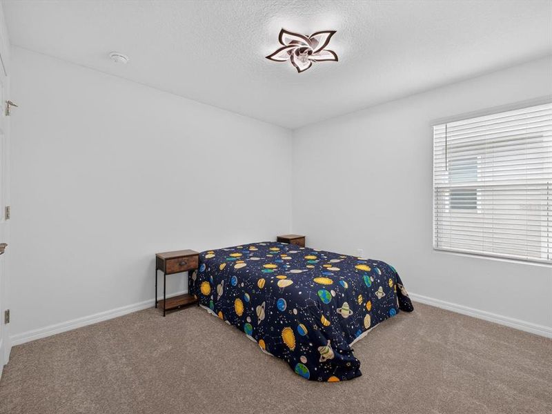 Furnished interior view inside a new home in Storey Creek, Kissimmee (Image 18).