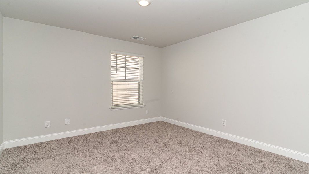Representative unfurnished interior of a home built from the Belfort by D.R. Horton in Heron Pointe, Myrtle Beach (Image 28).