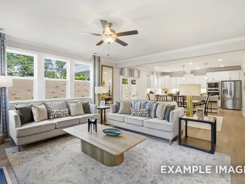 Furnished interior view inside a new home in Addison West, Holly Springs (Image 3).