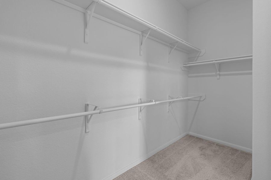 A view of your large primary walk-in Closet A view of your large primary walk-in Closet