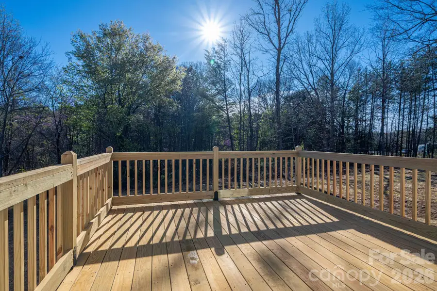 View from deck.  Woods bordering yard