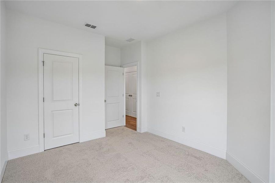 Spacious, unfurnished interior of a new home in Waterhaven, Cumming (Image 31).