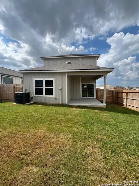 Front exterior of a new home in Highland Ridge, New Braunfels, TX, highlighting curb appeal (Image 11).
