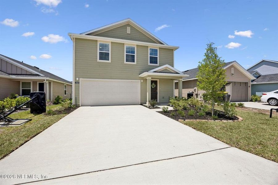 Front exterior of a new home in , Jacksonville, FL, highlighting curb appeal (Image 2). Front exterior of a new home in , Jacksonville, FL, highlighting curb appeal (Image 2).