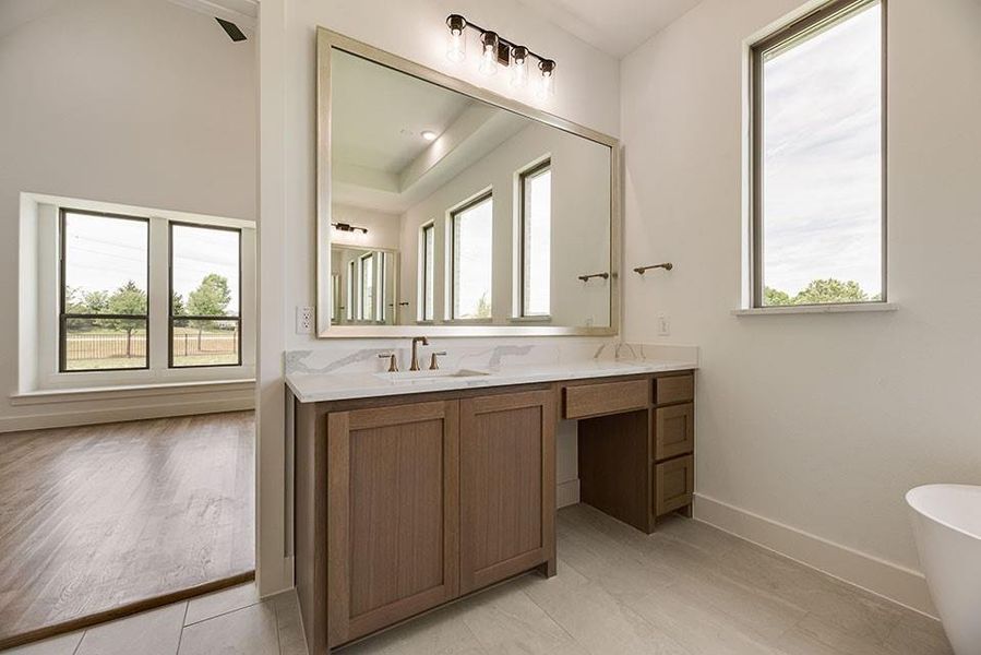 Furnished interior view inside a new home in King's Crossing - Phase 3, Parker (Image 13).
