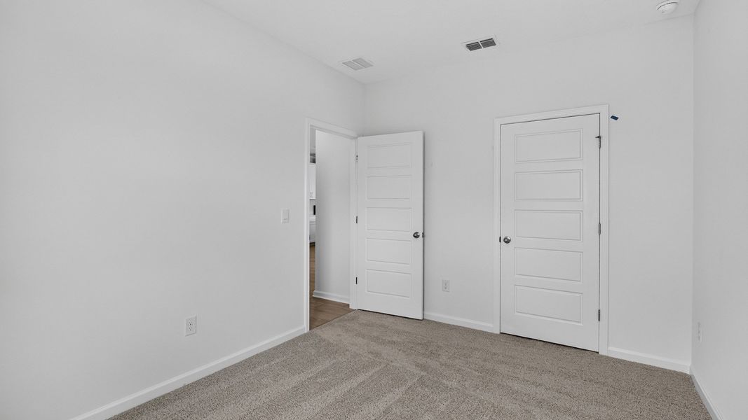 Representative unfurnished interior of a home built from the Riverside by D.R. Horton in Sawmill Branch, Palm Coast (Image 29).