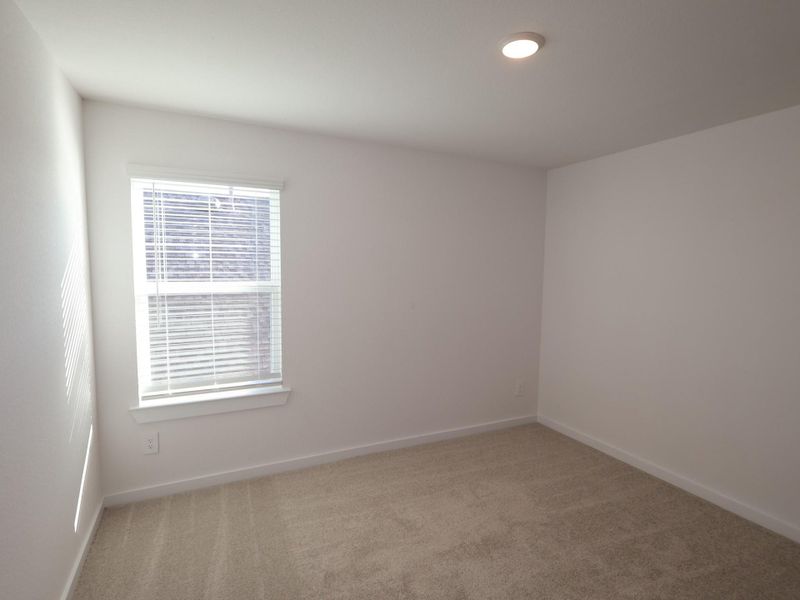 Spacious, unfurnished interior of a new home in Sorella, Tomball (Image 9).