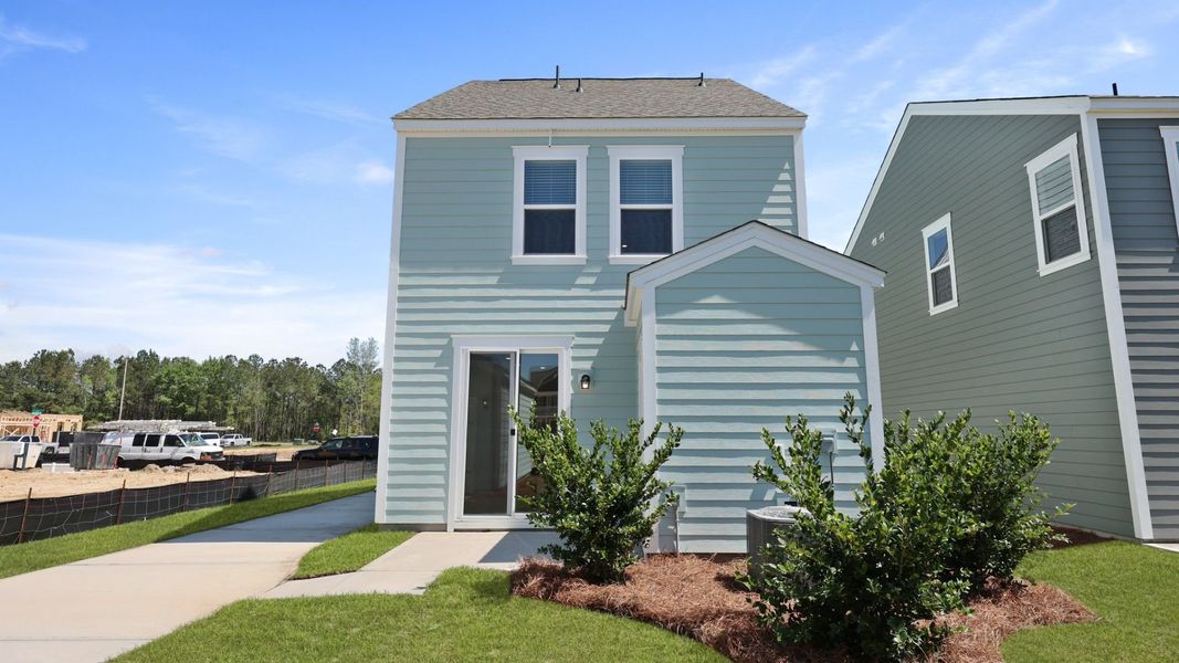 Front exterior of a new home in Sheep Island, Summerville, SC, highlighting curb appeal (Image 19).