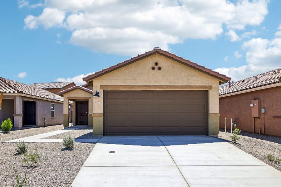 Front exterior of a new home in Mandarina Reserve, Marana, AZ, highlighting curb appeal (Image 2). Front exterior of a new home in Mandarina Reserve, Marana, AZ, highlighting curb appeal (Image 2).