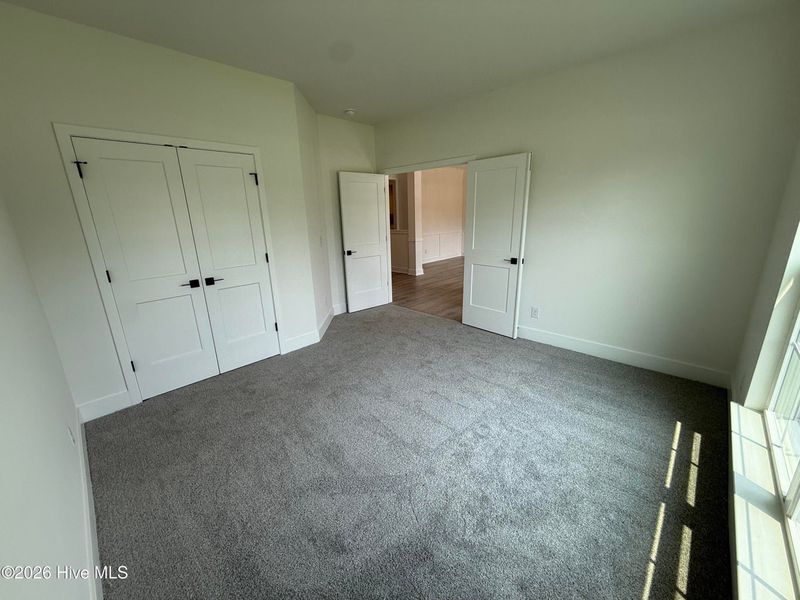 Spacious, unfurnished interior of a new home in Wood Creek Landing, Leland (Image 20). Spacious, unfurnished interior of a new home in Wood Creek Landing, Leland (Image 20).