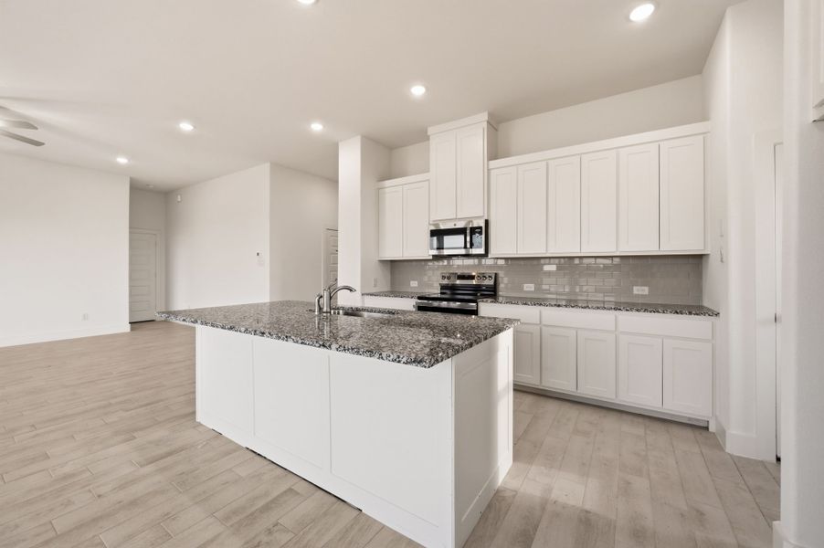 Furnished interior view inside a new home in Saddleback Estates, Boyd (Image 7).