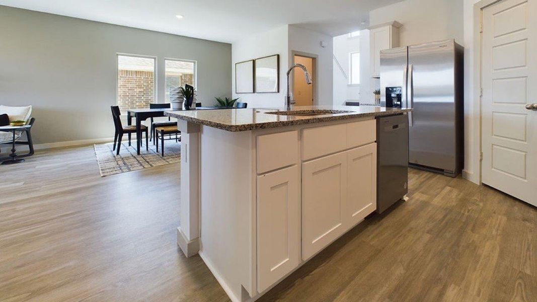 Representative furnished interior of a home built from the The Pierce by D.R. Horton in Overlook West, Wolfforth (Image 9).