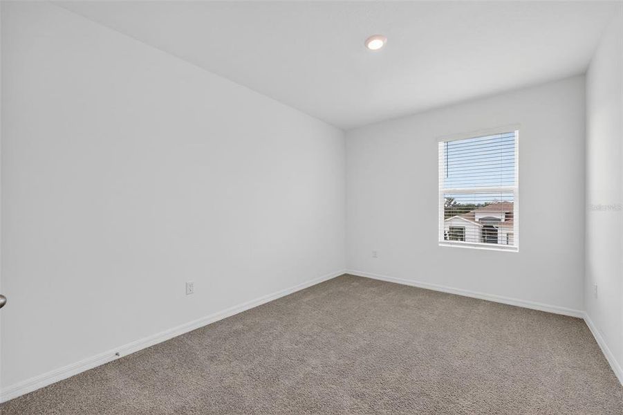 Spacious, unfurnished interior of a new home in Farm at Varrea, Plant City (Image 25).