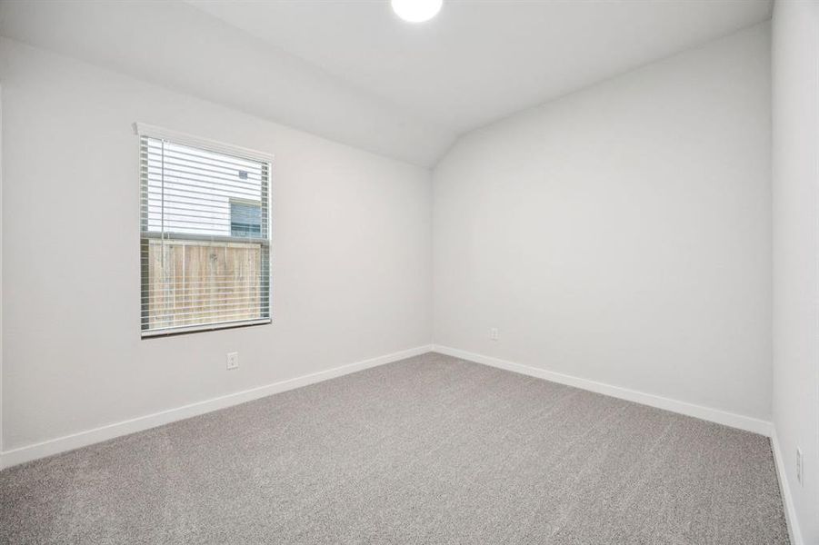 Bedroom in the Emmy II home plan by Trophy Signature Homes - REPRESENTATIVE PHOTO