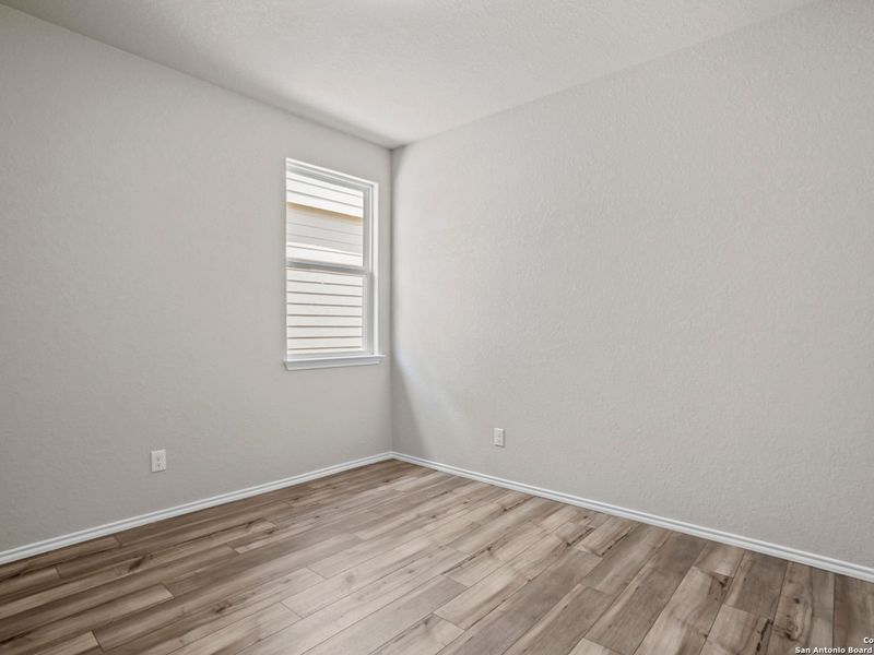 Spacious, unfurnished interior of a new home in Royal Crest, San Antonio (Image 20).