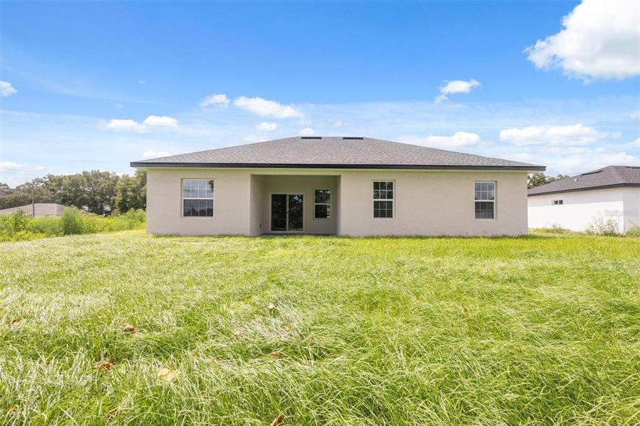 Exterior details and patio area of a home in , Ocala (Image 17).
