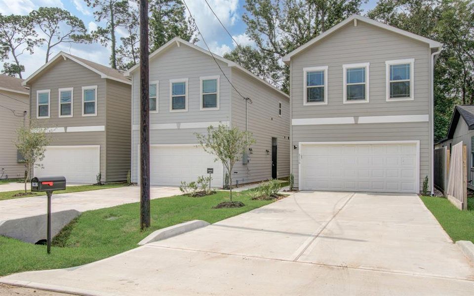 Beautiful new construction with side entry front door, private driveway & 2 car garage!