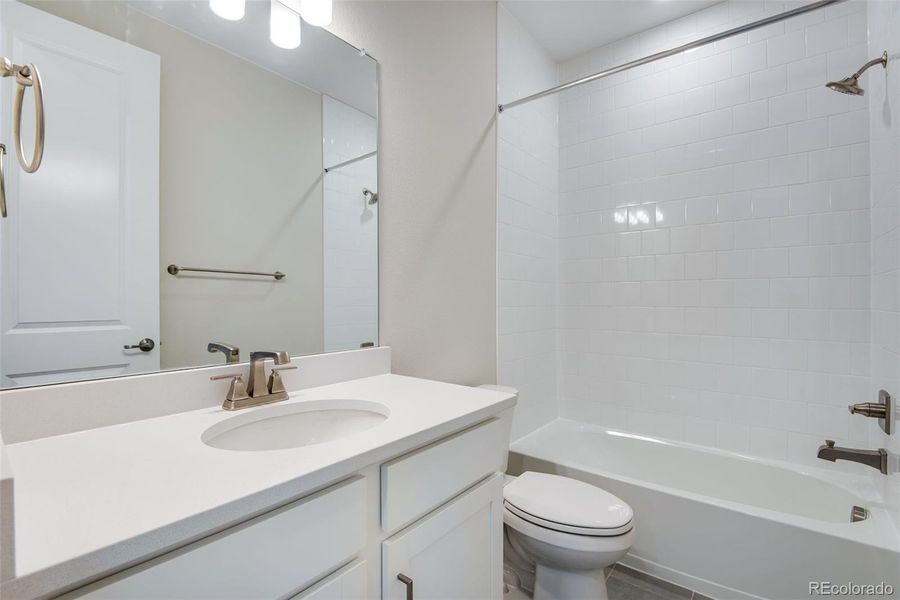 Furnished interior view inside a new home in Ensemble at The Aurora Highlands, Aurora (Image 6).