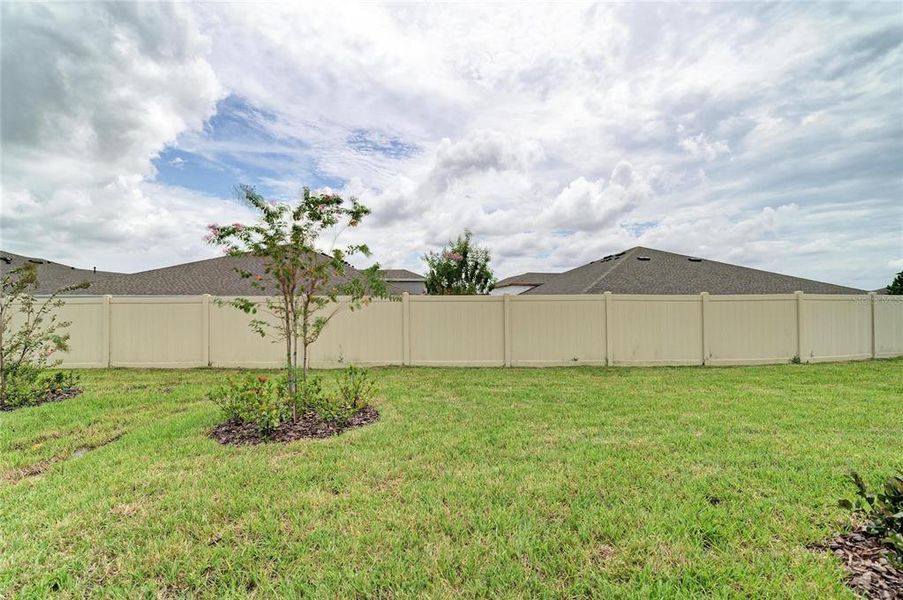 Exterior details and patio area of a home in Crosswind Point, Parrish (Image 3).