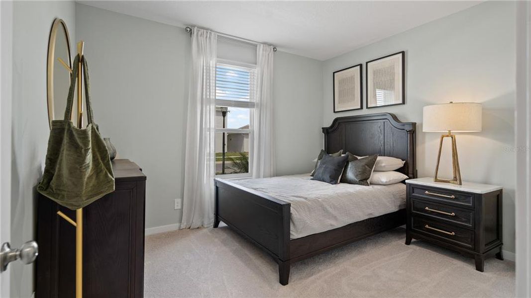 Furnished interior view inside a new home in Wellness Ridge, Clermont (Image 8).