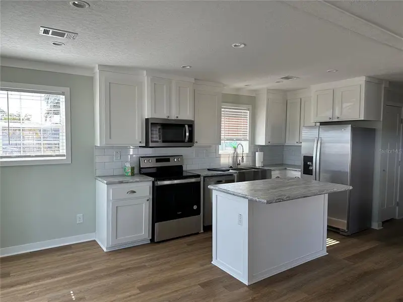 Furnished interior view inside a new home in , North Port (Image 6). Furnished interior view inside a new home in , North Port (Image 6).