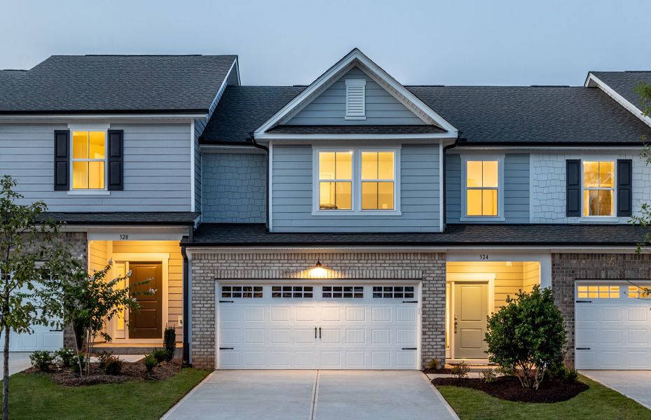 Front exterior of a new home in Exchange at 401, Raleigh, NC, highlighting curb appeal (Image 1). Front exterior of a new home in Exchange at 401, Raleigh, NC, highlighting curb appeal (Image 1).