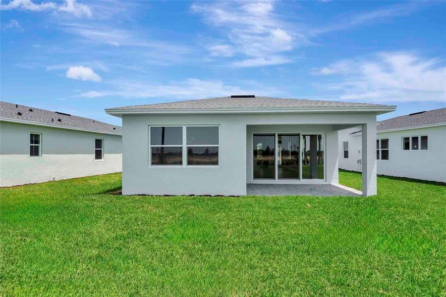 Exterior details and patio area of a home in Cresswind at Lake Harris, Tavares (Image 26).
