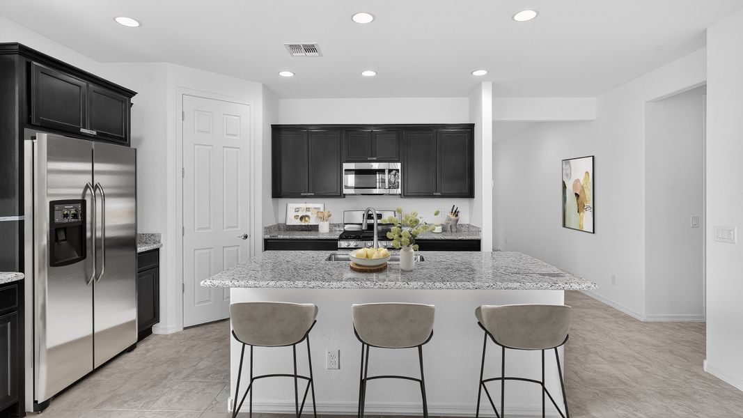 Representative furnished interior of a home built from the Origin by Taylor Morrison in Artisan at Asante, Surprise (Image 5).