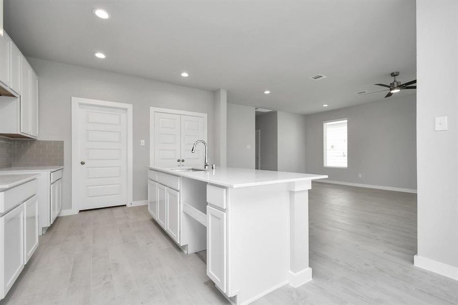 This generously spacious kitchen is a dream realized!