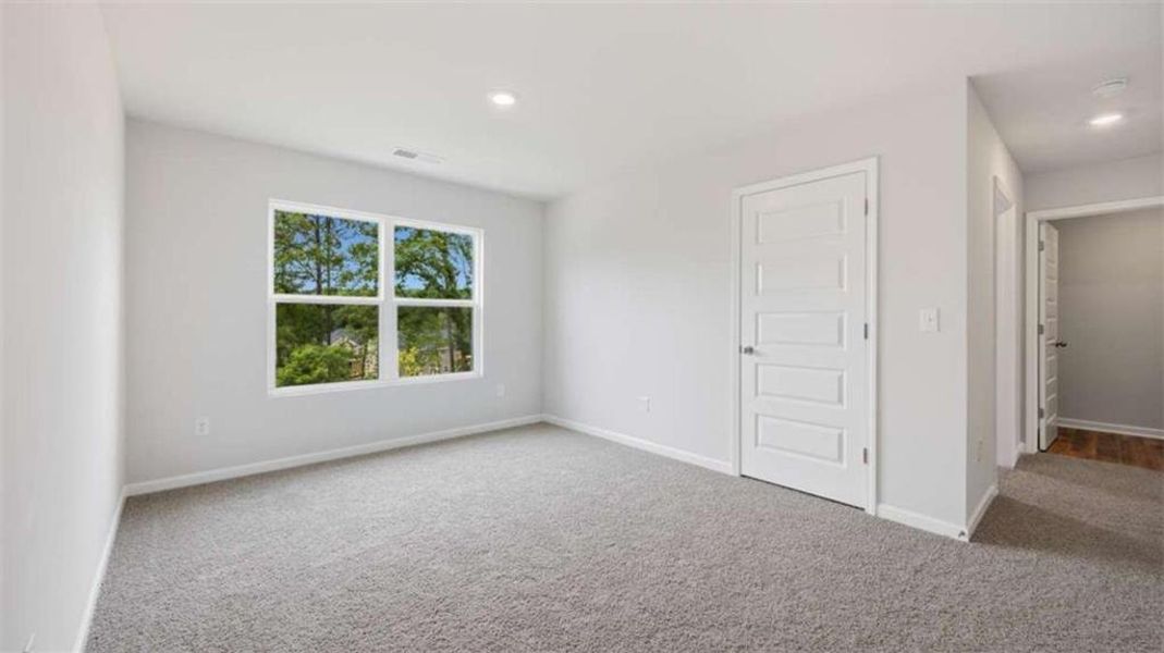 Spacious, unfurnished interior of a new home in Brooks Station, Dacula (Image 27).