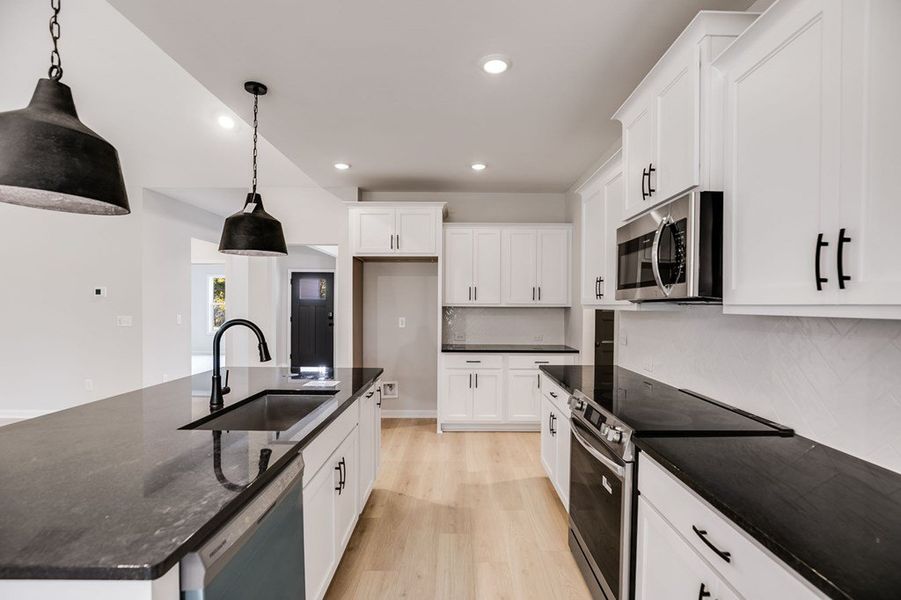 Furnished interior view inside a new home in LOVVORN ESTATES, Carrollton (Image 11).
