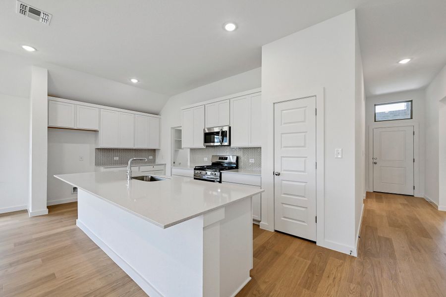Furnished interior view inside a new home in Prairie Winds, Hutto (Image 9).
