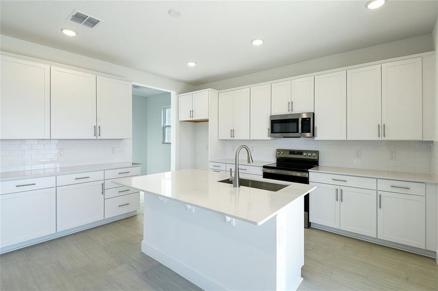 Furnished interior view inside a new home in , Tavares (Image 8). Furnished interior view inside a new home in , Tavares (Image 8).