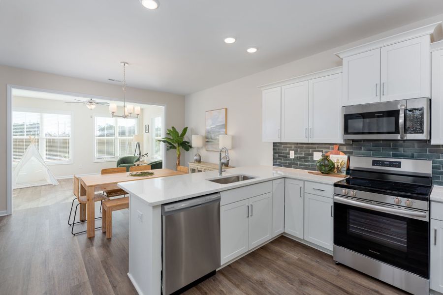 Furnished interior view inside a new home in River Tide Farms, Bolivia (Image 10).