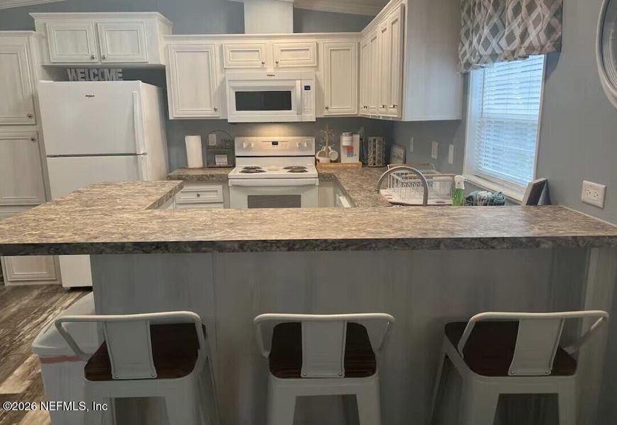 Furnished interior view inside a new home in , Satsuma (Image 13).