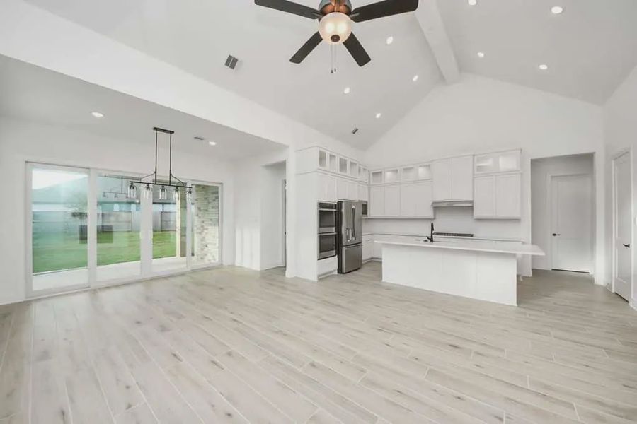 Representative unfurnished interior of a home built from the PT Bonneville by Chesmar Homes in Meridiana 50's and 60's, Manvel (Image 13).