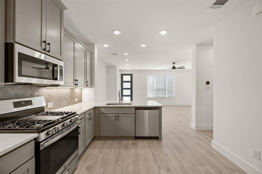 The chef in the family will never be left out of the party in this fantastic home!