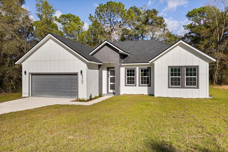 Front exterior of a new home in , Citrus Springs, FL, highlighting curb appeal (Image 20). Front exterior of a new home in , Citrus Springs, FL, highlighting curb appeal (Image 20).