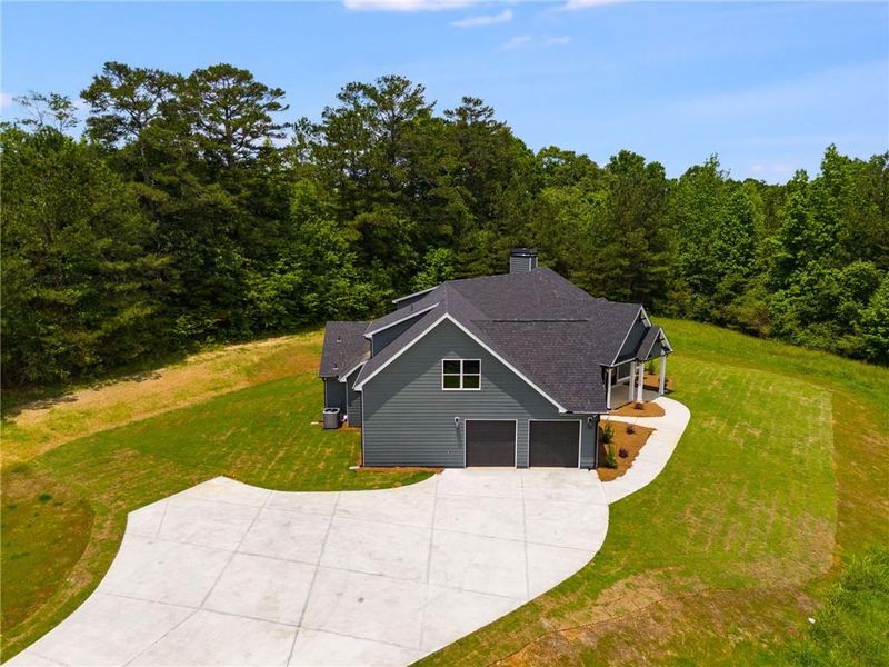 Exterior details and patio area of a home in The Meadows at Lake Circle, Buchanan (Image 30).