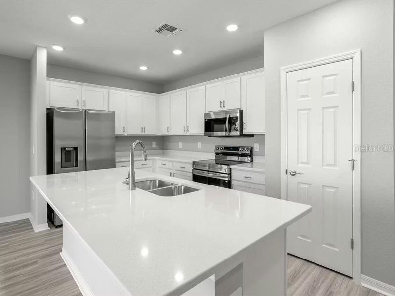 Furnished interior view inside a new home in VillaMar, Winter Haven (Image 5).