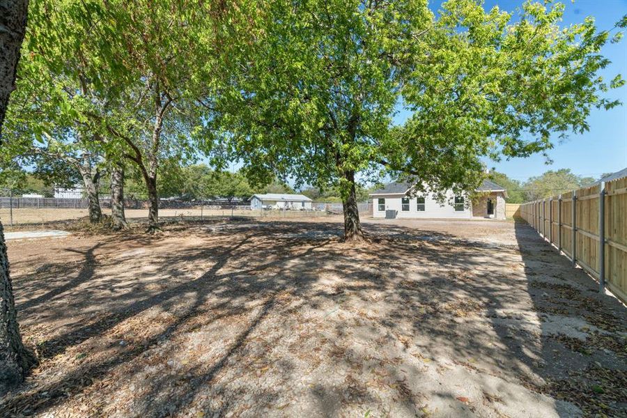 Exterior details and patio area of a home in , White Settlement (Image 29).