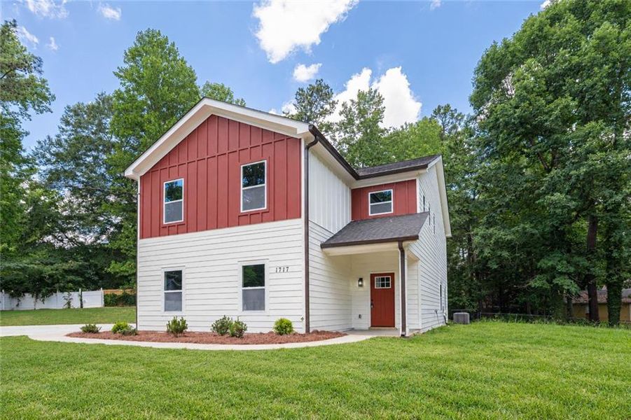 Front exterior of a new home in , Lithonia, GA, highlighting curb appeal (Image 21).