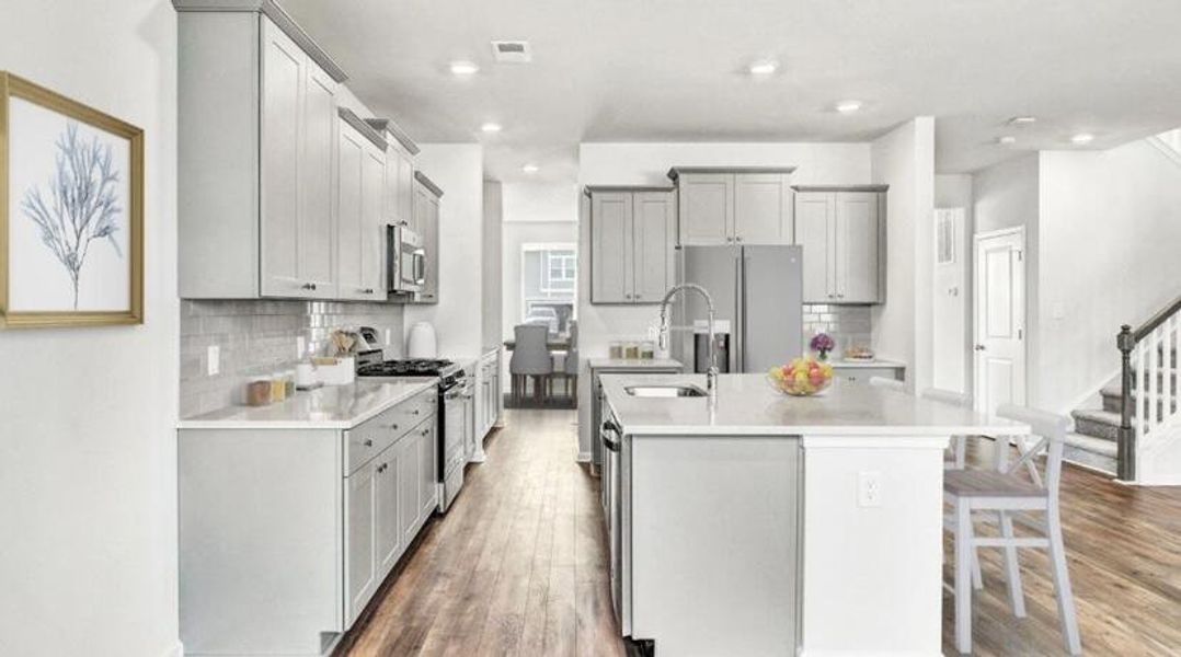 Furnished interior view inside a new home in Sweetgrass at Summers Corner, Summerville (Image 11).