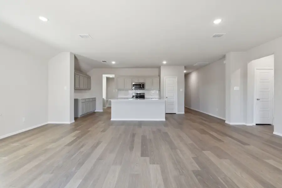 Open Floor Plan in the Harrison home plan by Trophy Signature Homes – REPRESENTATIVE PHOTO Open Floor Plan in the Harrison home plan by Trophy Signature Homes – REPRESENTATIVE PHOTO